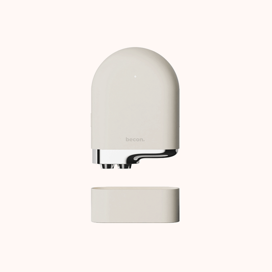 Becon AI skincare device in beige with detachable base for advanced skin analysis and treatment